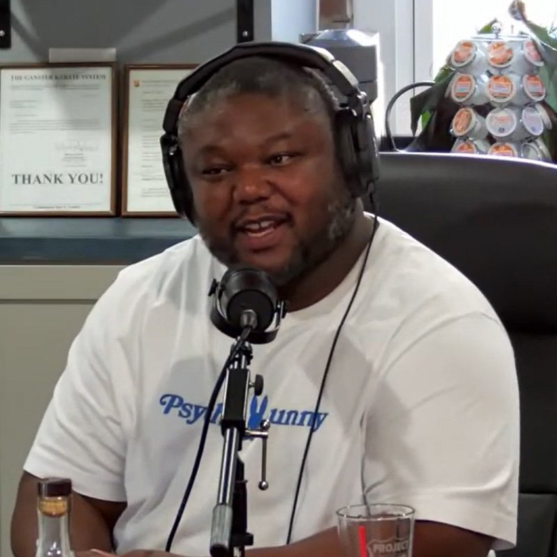 chad with headphones on in the middle of a show.