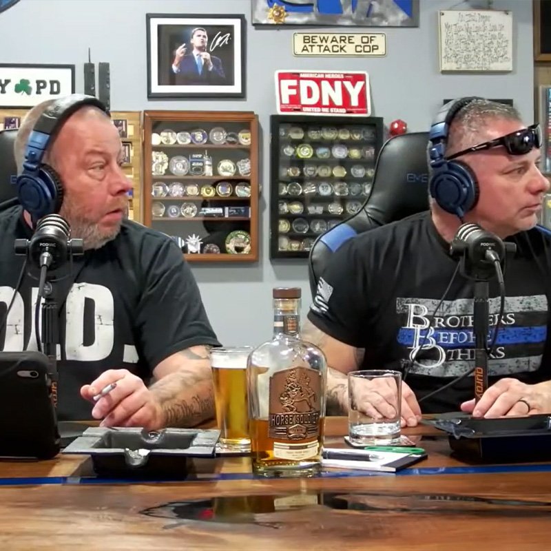 Dan and Turk looking over at something to their right (off screen.)