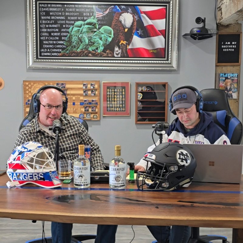 Fredericks and Freed in the middle of a Sports Beat show.