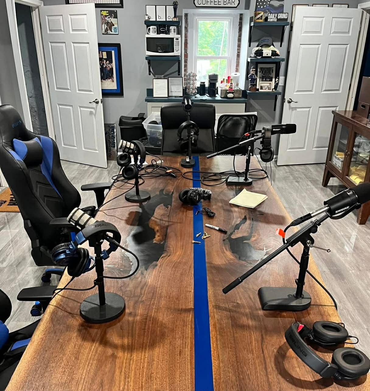 The studio table with mics on the table.